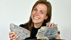 Geology PhD student Madeline Richter presents rock samples from the Taiwanese Yuli Belt.