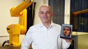 Prof Dr Joachim Denzler is a specialist in computer vision and has co-developed an AI that automatically recognizes people's emotional facial expressions automatically (small picture).